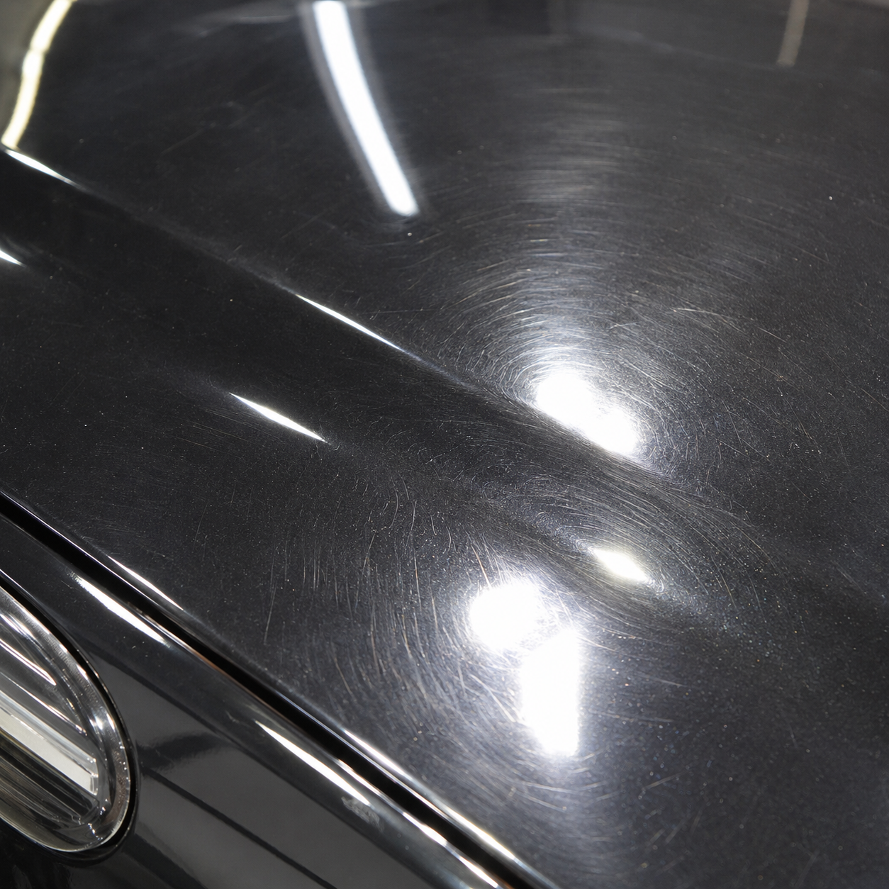 Before paint correction — swirl marks and scratches